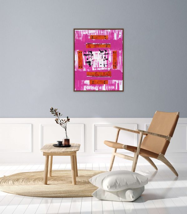 Pink + Orange Abstract on gray wall above chair